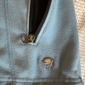 Women’s fleece outer jacket with zip pockets and thumb wrist on cuffs